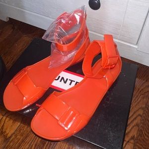 Gently Used Hunter Orange Jelly Sandals